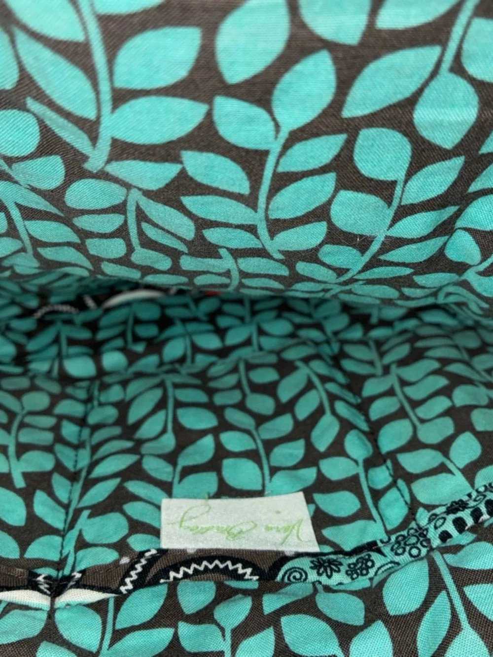 Vera Bradley Quilted Bag with Teal Floral Pattern on Brown